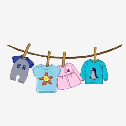 Four items of children's clothing hanging on a line held by clothespins.